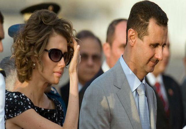 أسماء الأسد إلى جانب زوجها رئيس النظام السوري "أرشيف"